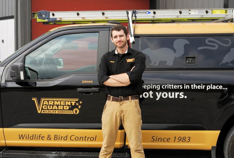 VG technician standing in front of truck