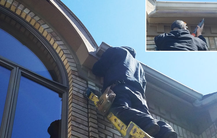 Tech Repairing Animal Dammage On Gutter